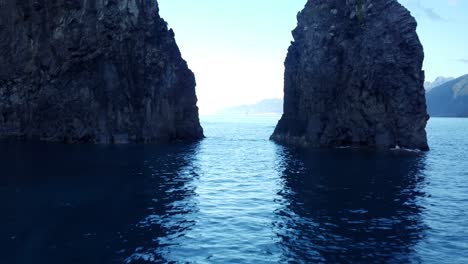 Aerial-slider-shot-of-massive-sea-stack-near-Ribeira-Da-Janela,-Madeira-Island-Portugal