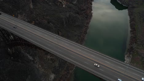 Twilight-Traffic-on-Perrine-Bridge,-Twin-Falls-Idaho-USA,-US-Highway-93,-Drone-Aerial-View