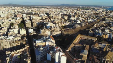 Drone-slowly-turning-while-flying-over-Palma-De-Mallorca