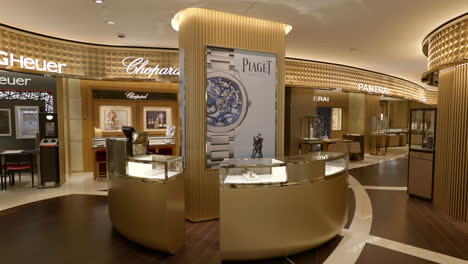 Inneneinrichtung-Des-Luxusuhrengeschäfts-In-Richtung-Piaget-Gold-Einzelhandelsmarketing-Verkaufstheke