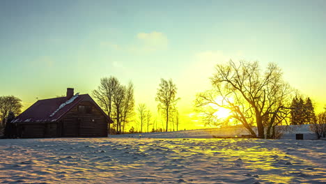 Beautiful-timelapse-of-could-moving-over-a-house-in-the-morning-with-the-trees-in-the-background-and-white-snow-around