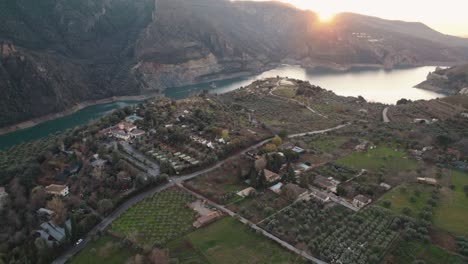 beautiful-circular-drone-footage-at-sunset-of-the-banks-of-the-Canales-Reservoir-in-Güéjar-Sierras-in-Spain