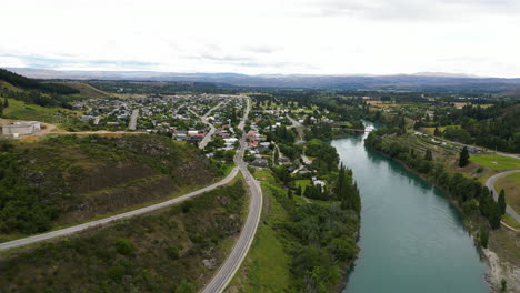 Aerial-View-Of-The-Clutha-River-Near-The-Clyde-Dam-In-Central-Otago,-New-Zealand