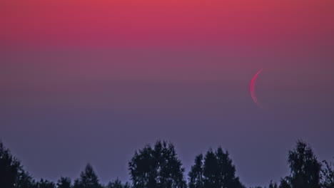 Waning-Crescent-moon-rise-in-red-color-sky,-fusion-time-lapse