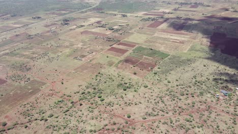 Land-farming-in-the-small-village-of-Africa,-Desert-zone-of-Loitokitok-Kenya-with-the-green-shrubs