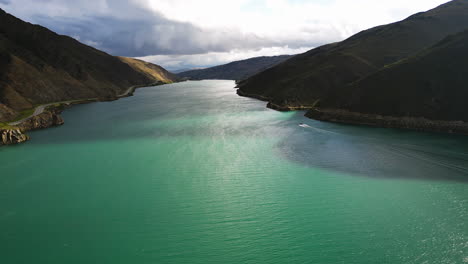 Drone-shot-from-Champagne-Gully-Freedom-Camping-over-scenic-Clutha-River,-Otago