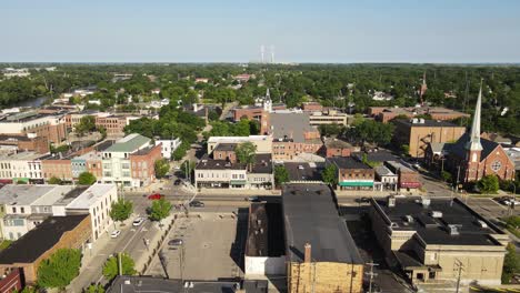 Low-aerial-drone-over-the-historical-town-of-Monroe,-South-Monroe-St,-Monroe-Michigan,-USA