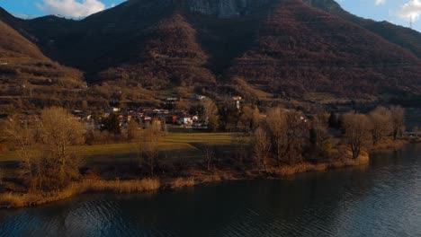 Aerial-view-of-an-autumn-landscape-of-a-lake-with-mountains-at-Lake-Endine-in-Italy