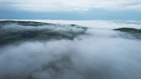 Aerial-shot-overhead-low-lying-clouds-in-the-Tatras-Mountains,-Slovakia