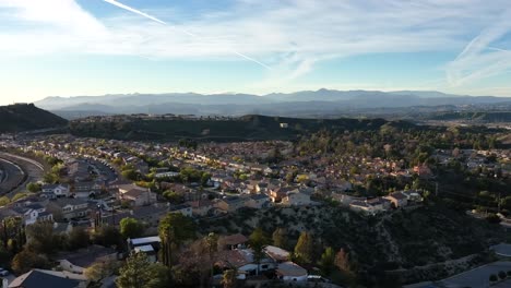 Aerial-View-of-Santa-Clarita,-Residential-Neighborhood-of-Los-Angeles-CA-USA-on-Golden-Hour-Sunlight,-Drone-Shot