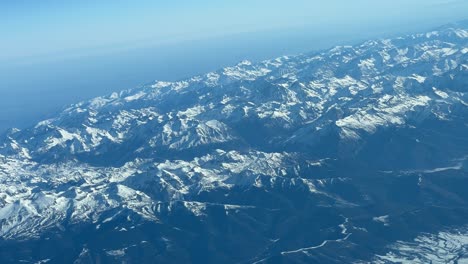 Panoramic-view-during-a-right-turn-of-the-Pyrenees-mountains-from-a-jet-cockpit-flying-from-Spain-to-France