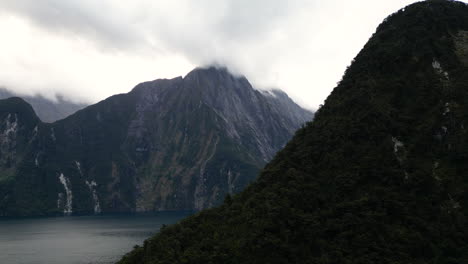 Aerial-view-of-iconic-Mitre-Peak-in-famous-Milford-Sound,-New-Zealand