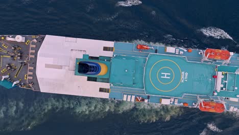 Helipad-on-ship-navigating-in-blue-sea-waters