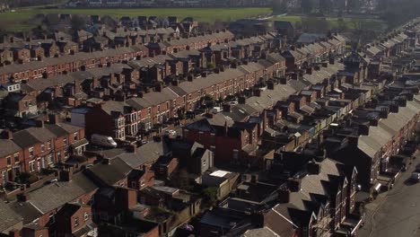 Aerial-view-reveals-rows-of-historic-terraced-houses-in-Dentons-Green,-St-Helens-neighbourhood