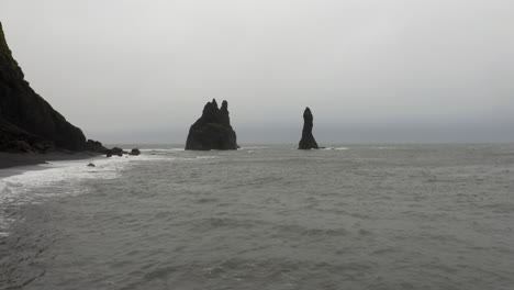 Drone-shot-of-Reynisdrangar-Rocks-in-a-stormy-sea