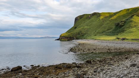 Beautiful-Scottish-landscape-and-stone-beach-near-Staffin-city-and-the-ruins-of-old-diatomite-factory-at-Isle-of-Skye