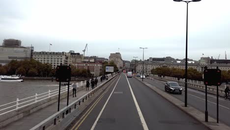 London,-England---October-25-2019:-First-person-view-of-bus-journey-across-London's-Waterloo-Bridge-during-the-day