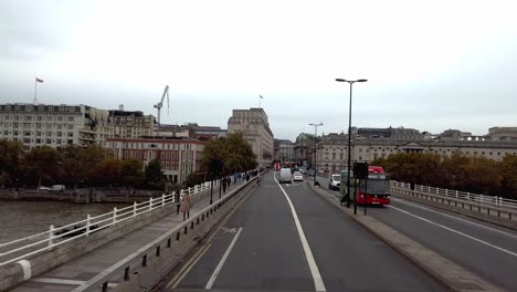 London,-England---October-25-2019:-First-person-view-of-bus-journey-across-London's-Waterloo-Bridge-during-the-day