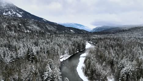 The-Majestic-Adams-River-Surrounded-by-Evergreen-Forests-and-Foggy-Mountains