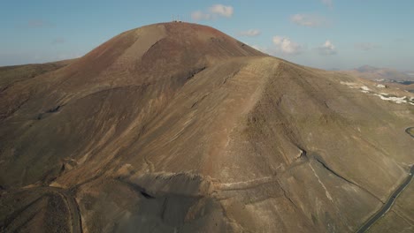 Drone-flight-along-the-majestic-Los-Ajaches-mountain-peaks,-Lanzarote,-Canary-Island