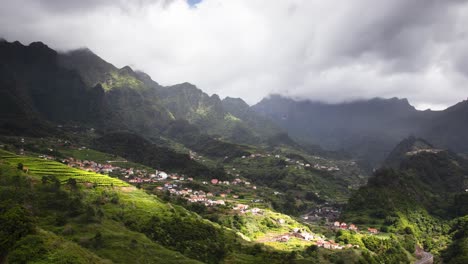 Time-lapse-of-village-in-green-volcanic-mountain-valley-landscape,-Sao-Vicente,-Madeira