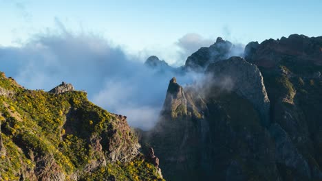 Fog-Time-lapse-of-Arieiro-mountain-rocky-peak-with-tourist-on-viewpoint