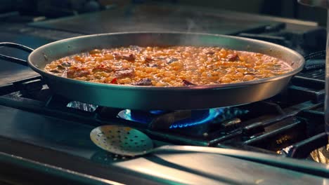 Paella-with-boiling-in-spanish-restaurant-kitchen