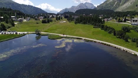 Aerial-View-Of-Lake-Silvaplana-and-Swiss-Town-In-Summer-In-Grisons,-Switzerland