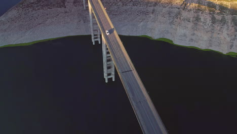 Suspension-bridge-over-the-reservoir-of-Iznájar,-Córdoba,-Spain