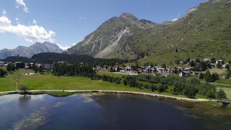 Aerial-Orbit-Motion-Over-Lake-Silvaplana-Lake-With-Scenic-Mountain-Views-In-Background
