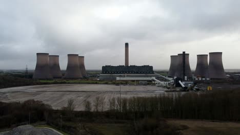 Aerial-view-over-coal-fired-power-station-site,-Fiddlers-Ferry-overcast-smokestack-skyline