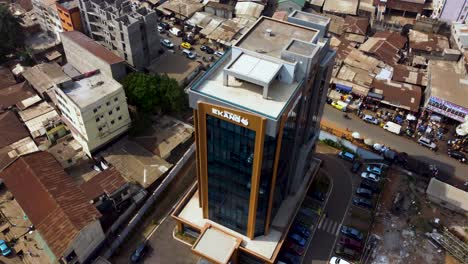 Ekang-Commercial-Building-in-City-of-Yaounde,-Cameroon---Aerial-Approach