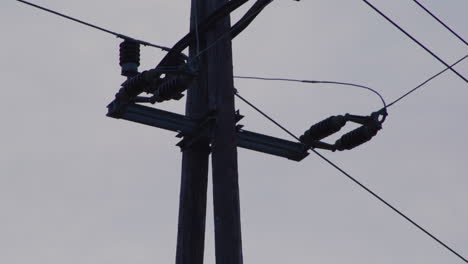 Close-up-of-an-electricity-pylon-at-sunrise.