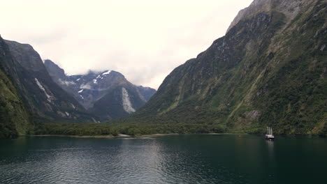 Drone-view-of-Milford-Mariner-in-Harrison-Cove,-Milford-Sound,-New-Zealand
