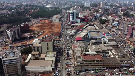 Capital-City-of-Yaounde-in-Developing-Country-of-Cameroon,-Africa---Aerial-Tilt-up-Establisher