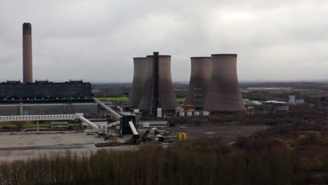 Aerial-view-over-coal-fired-power-station-smokestack-site,-Fiddlers-Ferry-overcast-skyline