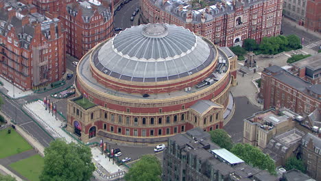 Slow-aerial-rotating-shot-around-the-Royal-Albert-Hall-in-London,-England,-United-Kingdom