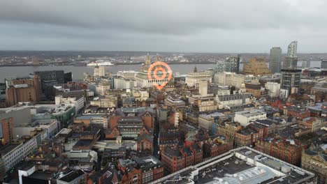 Aerial-view-of-Liverpool-city-with-GPS-location-pin-graphic-overlay-over-hotels-and-public-interest-property