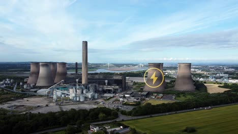 Energy-icon-overlay-flashing-on-coal-fired-power-station-smokestack-aerial-orbiting-view