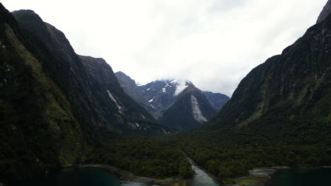 Mt-Pembroke-and-Harrison-cove-in-Milford-Sound,-aerial-drone-view