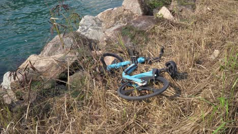 Discarded-Hire-Rental-Bike-In-Beside-River-In-Tseung-Kwan-O-In-Hong-Kong