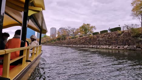 View-from-a-traditional-boat-cruise-on-the-castle-moat-onto-the-famous-Osaka-castle-in-Japan