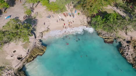 La-Caleta-beach-with-turquoise-ocean-waters,-Boca-Chica-in-Dominican-Republic