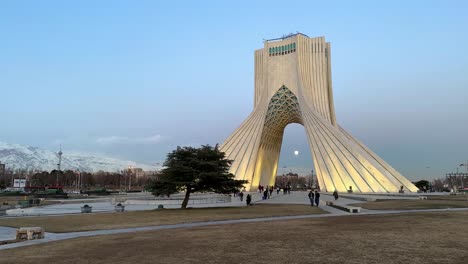 People-Traveling-to-Iran-Tehran-the-capital-city-of-the-country-in-middle-east-visit-iconic-landmark-minimal-landscape-tourist-attraction-in-city-center-downtown-Azadi-square-Shahyad-tower-museum-art