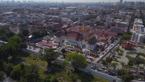 Calm-aerial-view-flight-Bangkok-temple-Wat-Mahannapharam-Worawihan-thailand,-sunny-day-2022
