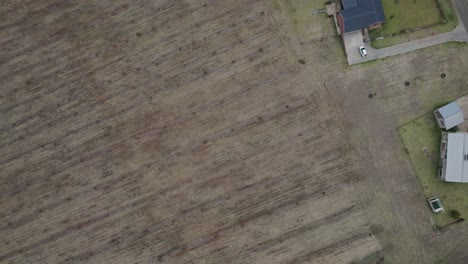 Rural-farmlands-community---aerial-TOP-down-shot-Buildings-and-solar-panels