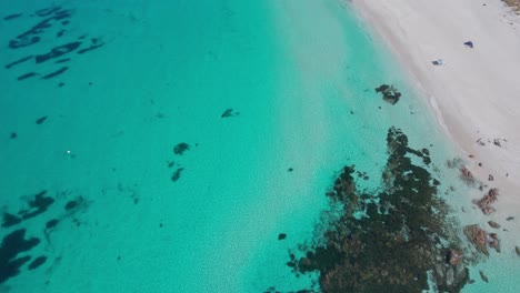 Aerial-drone-footage-of-the-turquoise-clear-waters-of-the-paradise-beach-bunker-bay-in-Western-Australia