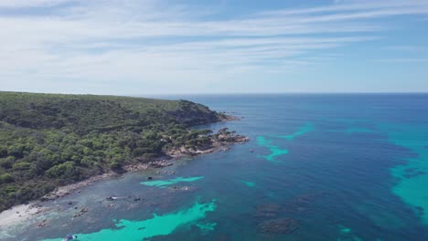 Aerial-footage-flying-over-the-turquoise-waters-and-native-bushland-of-bunker-bay-in-Western-Australia