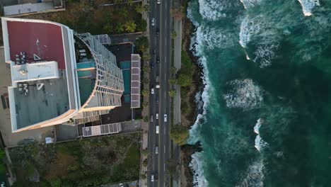 Aerial-top-down-forward-directly-above-George-Washington-Avenue-along-Malecon,-Santo-Domingo-in-Dominican-Republic