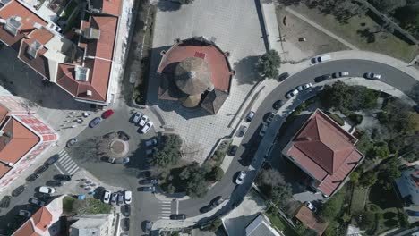 aerial-clowup-view-from-above-to-chapel-with-red-roof-in-europe